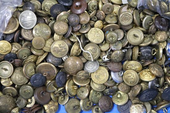 A collection of Military buttons and badges
